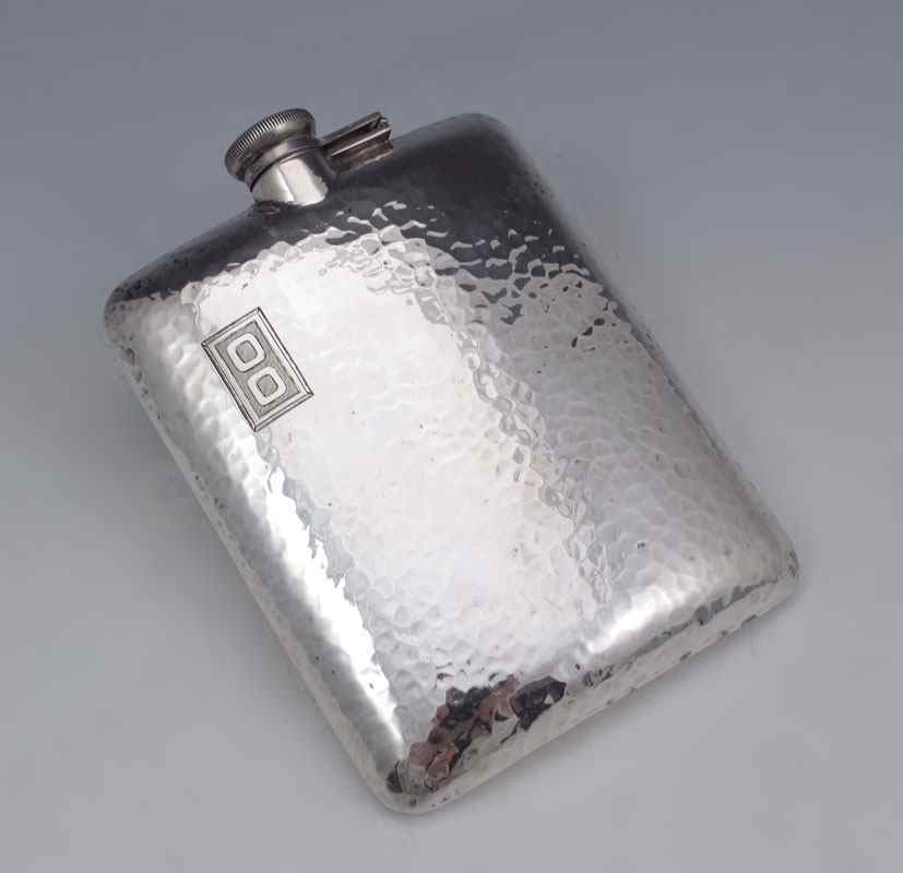 Appraisal: CLARENCE VANDERBILT HAND HAMMERED STERLING FLASK Hand hammered pint flask