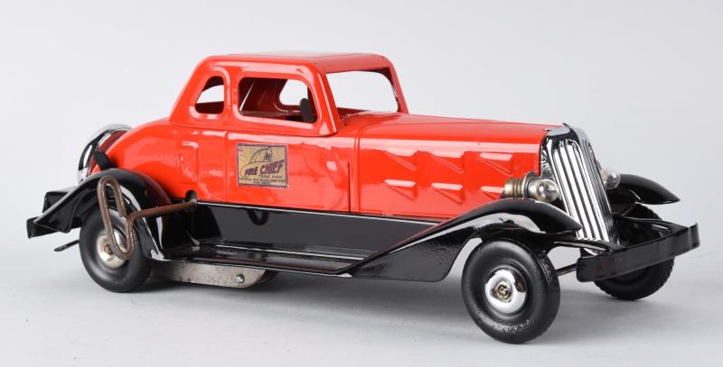 Appraisal: Hoge Red Fire Chief Deluxe Coupe Automobile Toy This restored