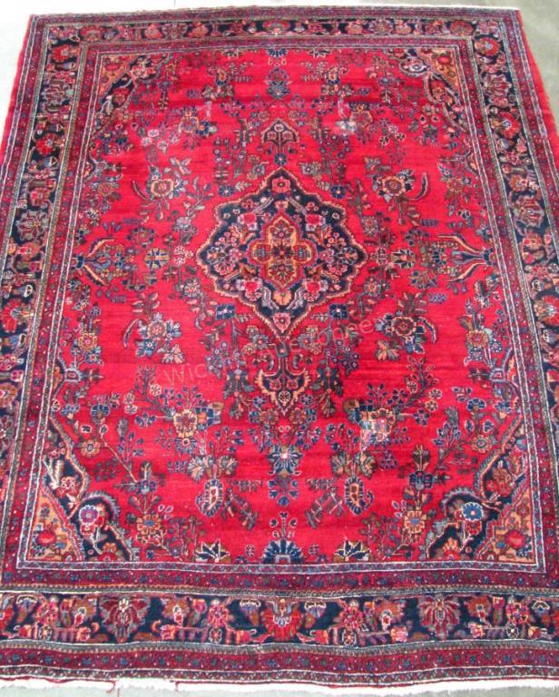 Appraisal: Handmade Oriental Room Size Rug Mashad design red field with