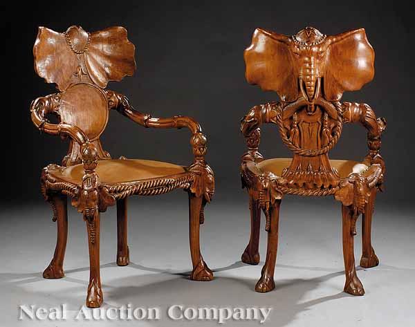 Appraisal: A Pair of Carved Hardwood Zoomorphic Fantasy Armchairs in the