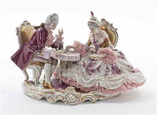 Appraisal: A German Porcelain Lace Figural Group in the form of