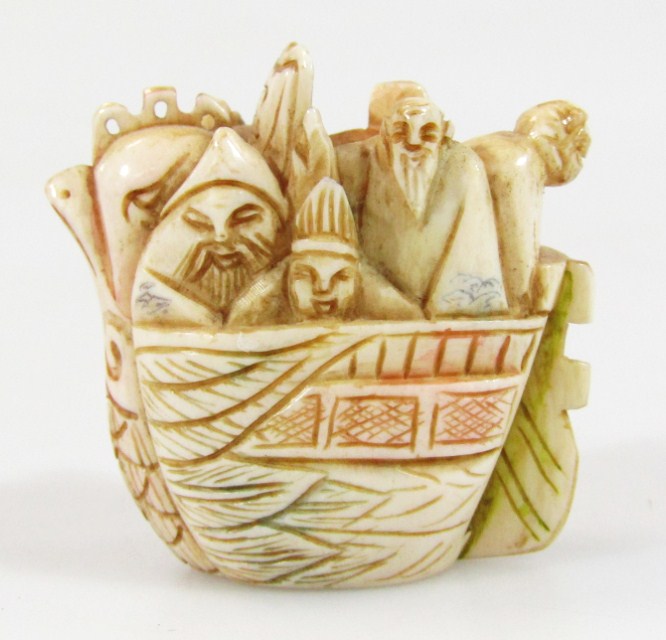 Appraisal: A thC Japanese Meiji period netsuke formed as figures in