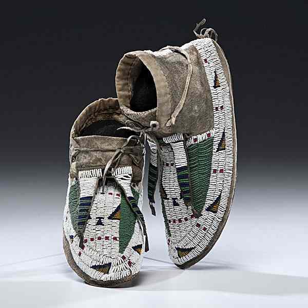 Appraisal: Sioux Beaded Hide Moccasins thread and sinew-sewn using bead colors