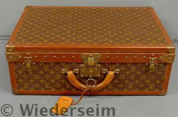 Appraisal: Louis Vuitton suitcase c with interior tray and original key