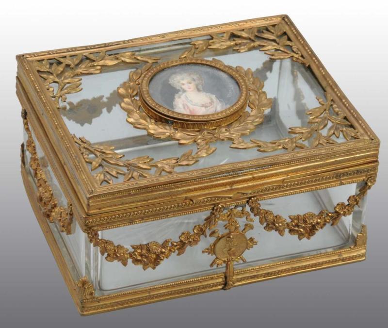 Appraisal: French Crystal Gilt Brass Box Description Includes May signed ivory