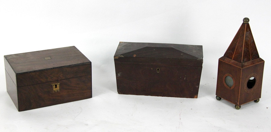 Appraisal: A mahogany tea caddy of sarcophagus shape a Victorian work