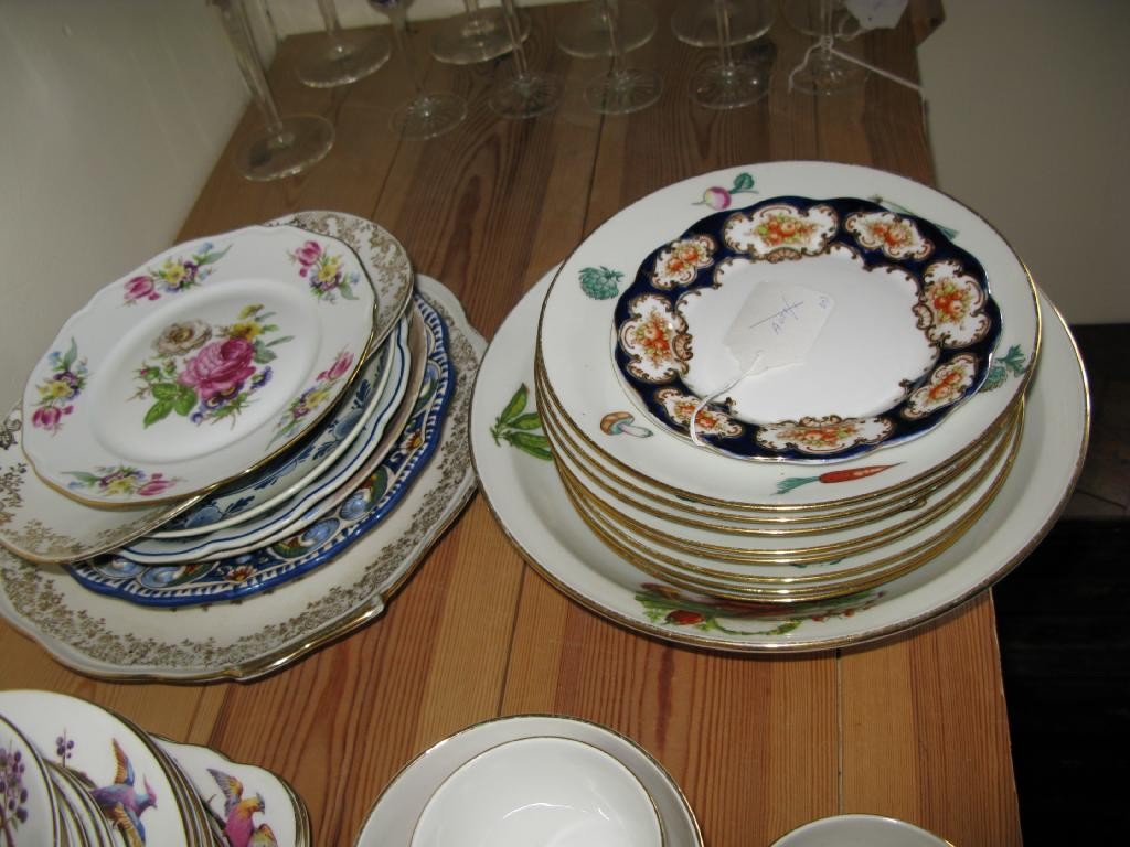 Appraisal: A French set of plates nine pieces including serving plate