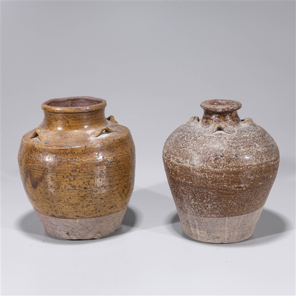 Appraisal: Two Chinese Yuan dynasty brown glazed jars each with handles