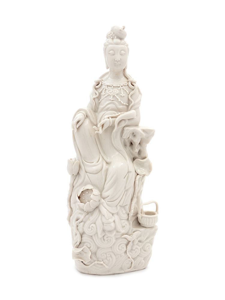 Appraisal: A Chinese Blanc-de-Chine Porcelain Figure of Guanyin A Chinese Blanc-de-Chine