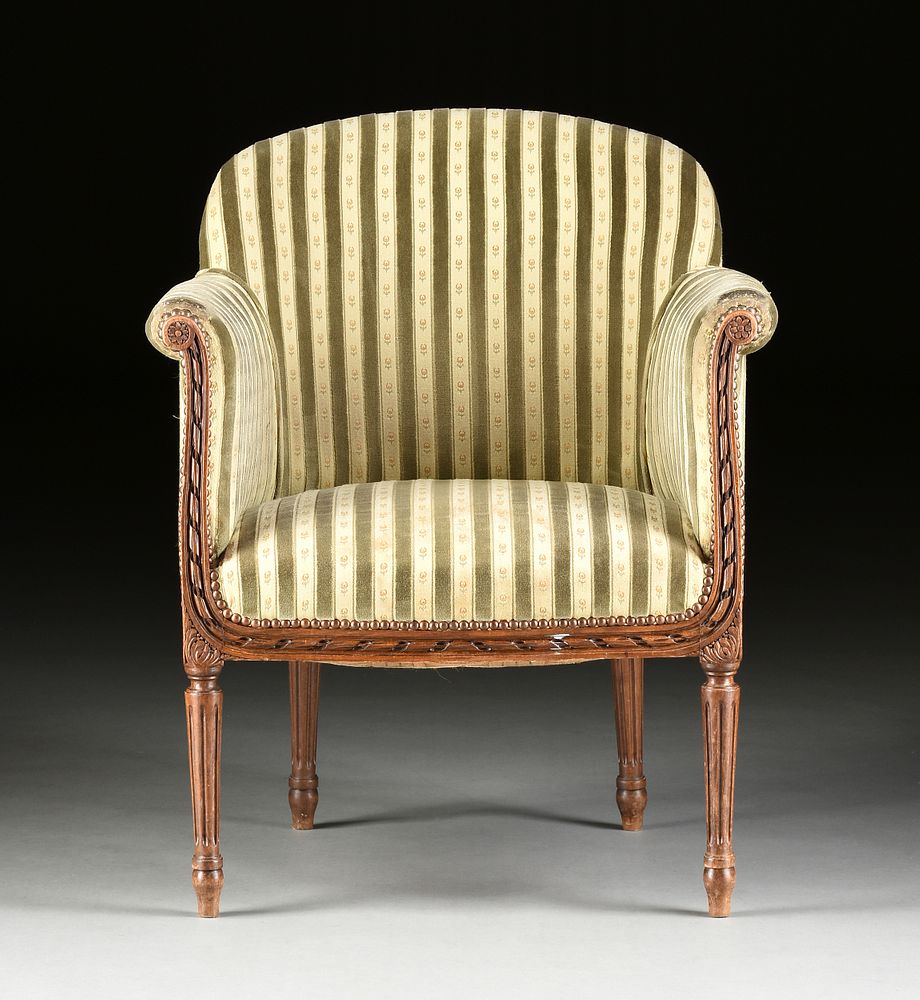 Appraisal: AN ELEGANT LOUIS XVI REVIVAL UPHOLSTERED AND CARVED WALNUT BERG