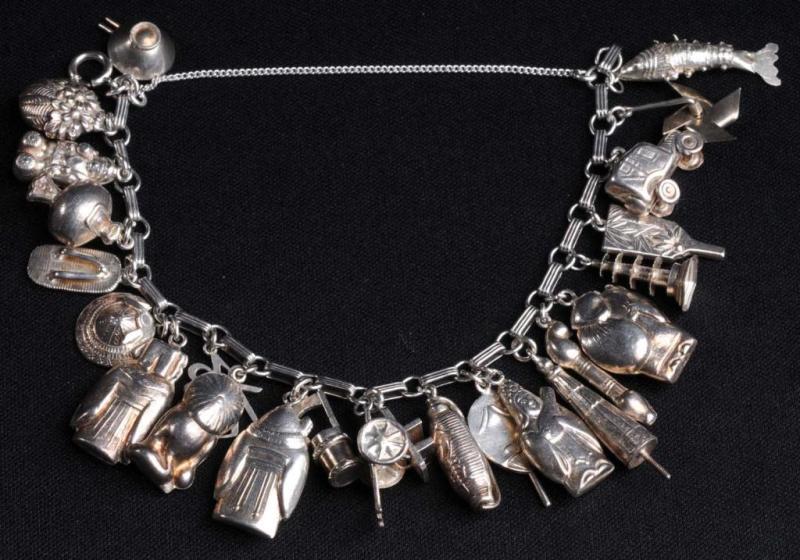 Appraisal: Silver Chinese Charm Bracelet with Charms Description Marked Silver Condition