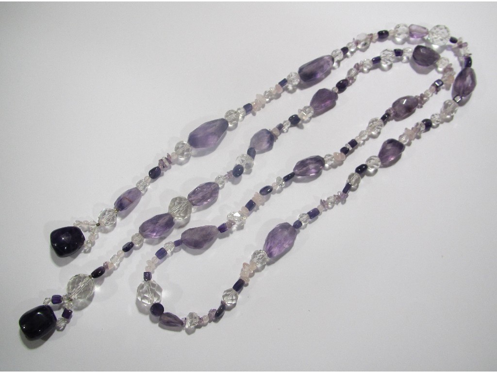 Appraisal: Long string of crystal and amethyst glass beads