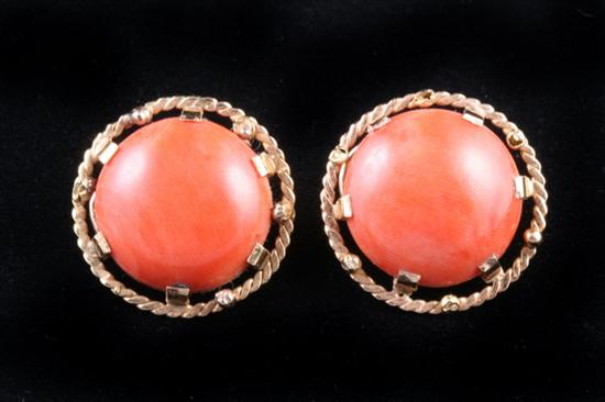 Appraisal: PAIR FRENCH K YELLOW GOLD AND ORANGE CORAL CABOCHON BUTTON