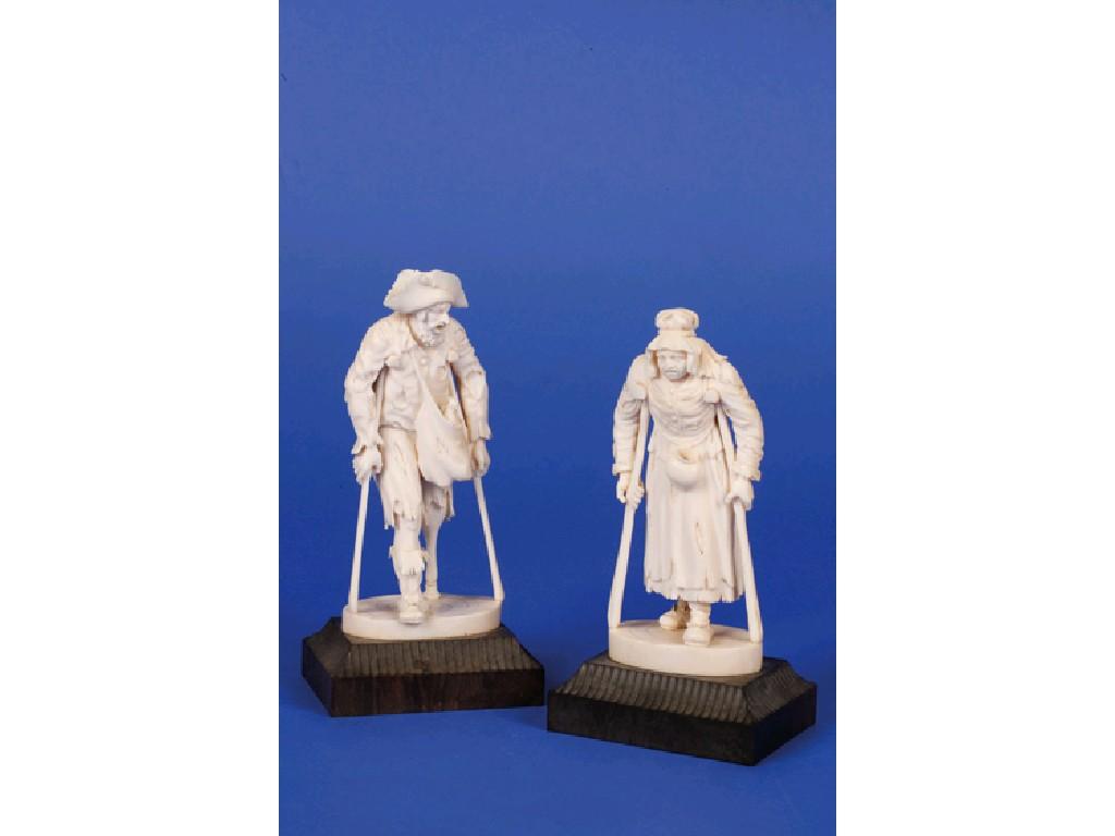 Appraisal: A CARVED IVORY FIGURE OF A ONE LEGGED PIRATE on