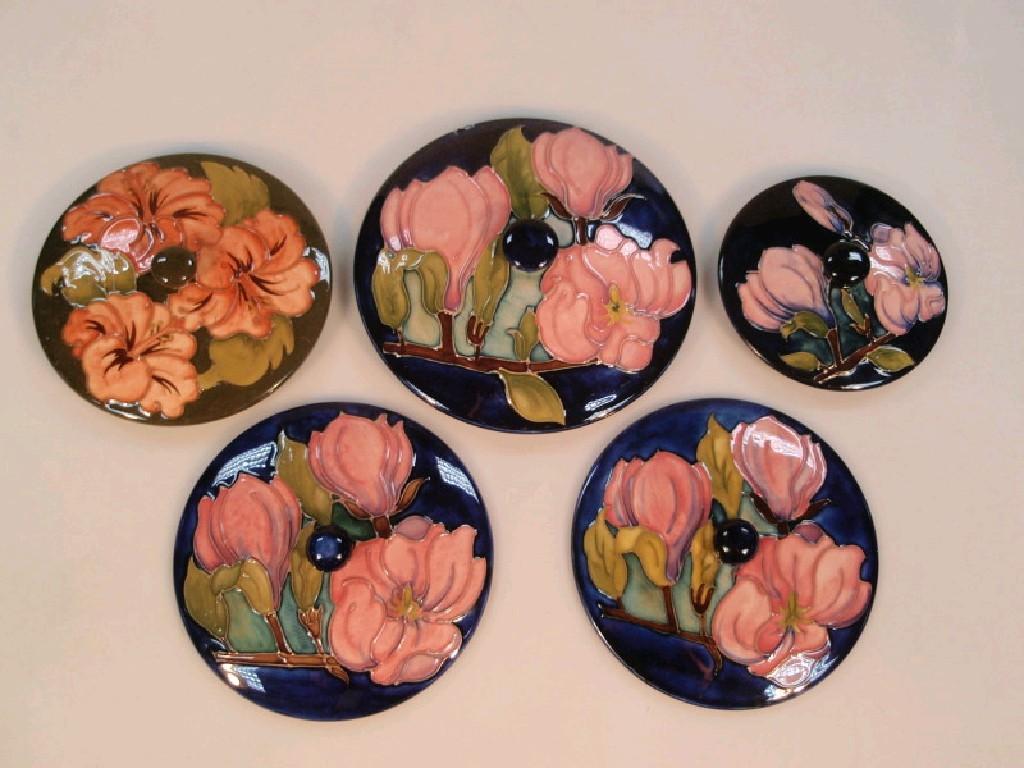 Appraisal: Five assorted Moorcroft covers