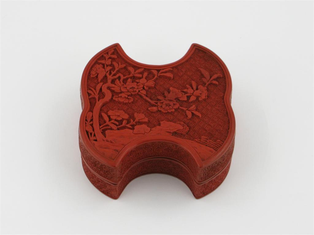 Appraisal: A Chinese red cinnabar lacquer box and cover