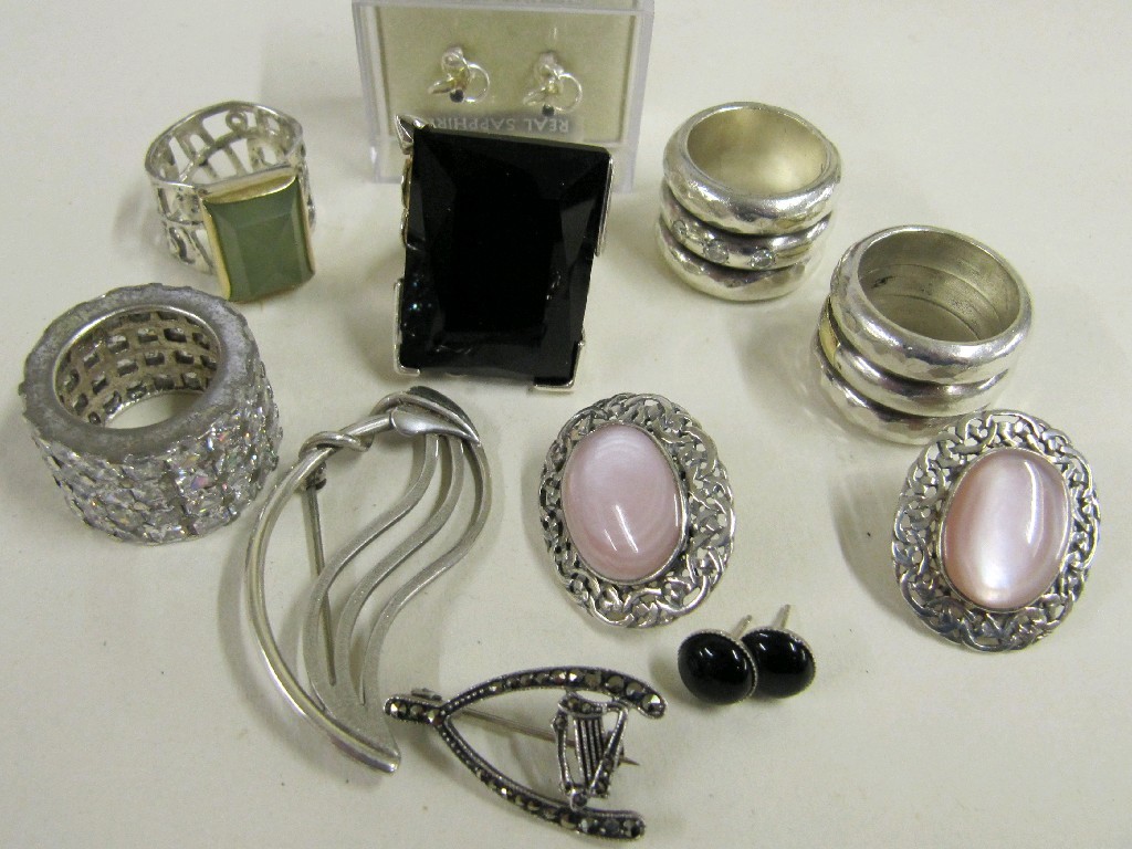 Appraisal: Lot comprising four silver gem set rings a with metal