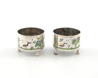 Appraisal: A pair of Middle Eastern silver and enamel salt cellars