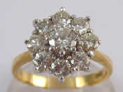 Appraisal: A yellow metal tests carat gold diamond cluster ring estimated