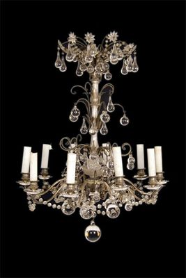 Appraisal: A plated and glass ten light electrolier with scroll branches