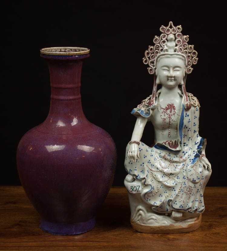 Appraisal: CHINESE QING POTTERY FIGURAL SCULPTURE AND VASE The seated Buddha