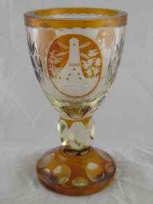 Appraisal: A large heavy continental glass flashed with amber slice cut