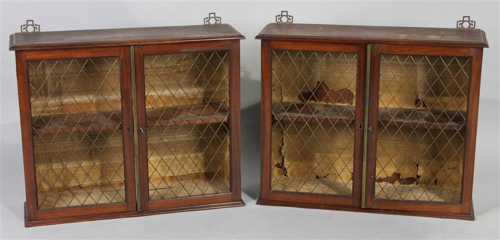 Appraisal: PAIR OF CHINESE CHIPPENDALE STYLE MAHOGANY HANGING BOOKCASES WITH FRONT