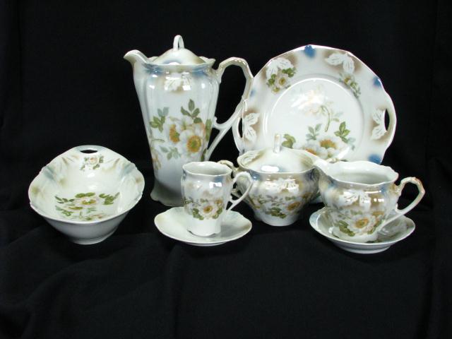 Appraisal: Porcelain Chocolate Set with Floral Motif including pot cream and