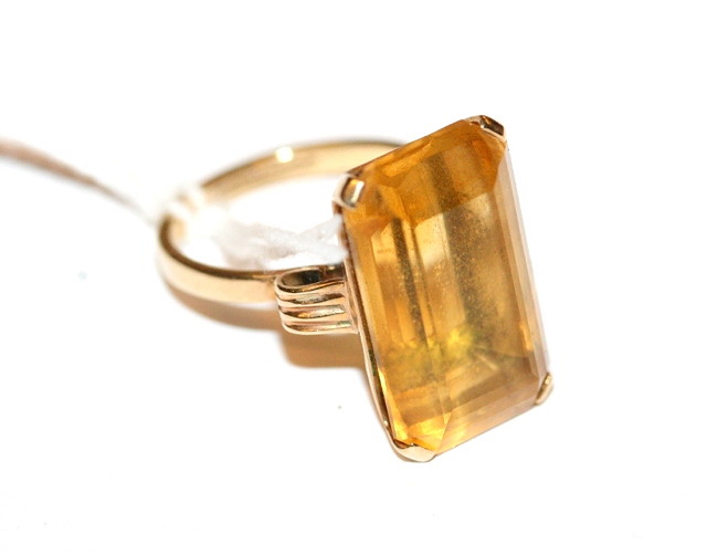 Appraisal: A CITRINE SET DRESS RING emerald cut citrine mounted in