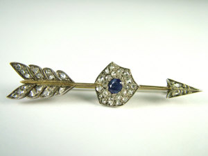 Appraisal: An Edwardian sapphire diamond 'Cupids Arrow' brooch With pin fitted