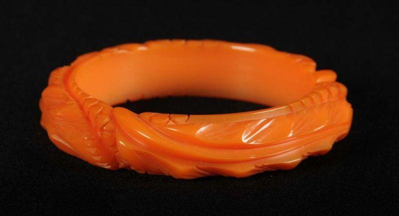 Appraisal: Bakelite Deeply Carved Orange Floral Bracelet Condition Excellent Size -