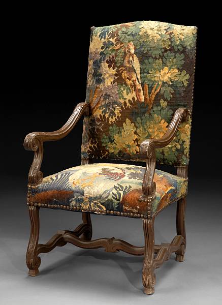 Appraisal: A Baroque style needlepoint upholstered armchair height in width in