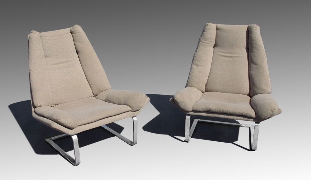 Appraisal: PAIR OF MID CENTURY DESIGNER CHAIRS Worn grey fabric with