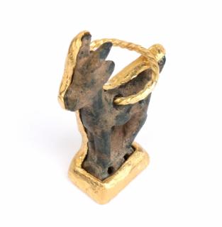 Appraisal: - k gold mounted Roman bronze goat amulet the standing