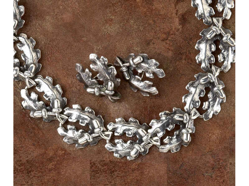 Appraisal: SILVER NECKLACE AND EARRINGS FROM DENMARK Vintage necklace and screw