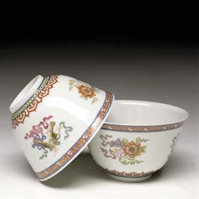 Appraisal: PAIR JIAJING FAMILLE ROSE BOWLS Pair delicately Famille Rose enameled