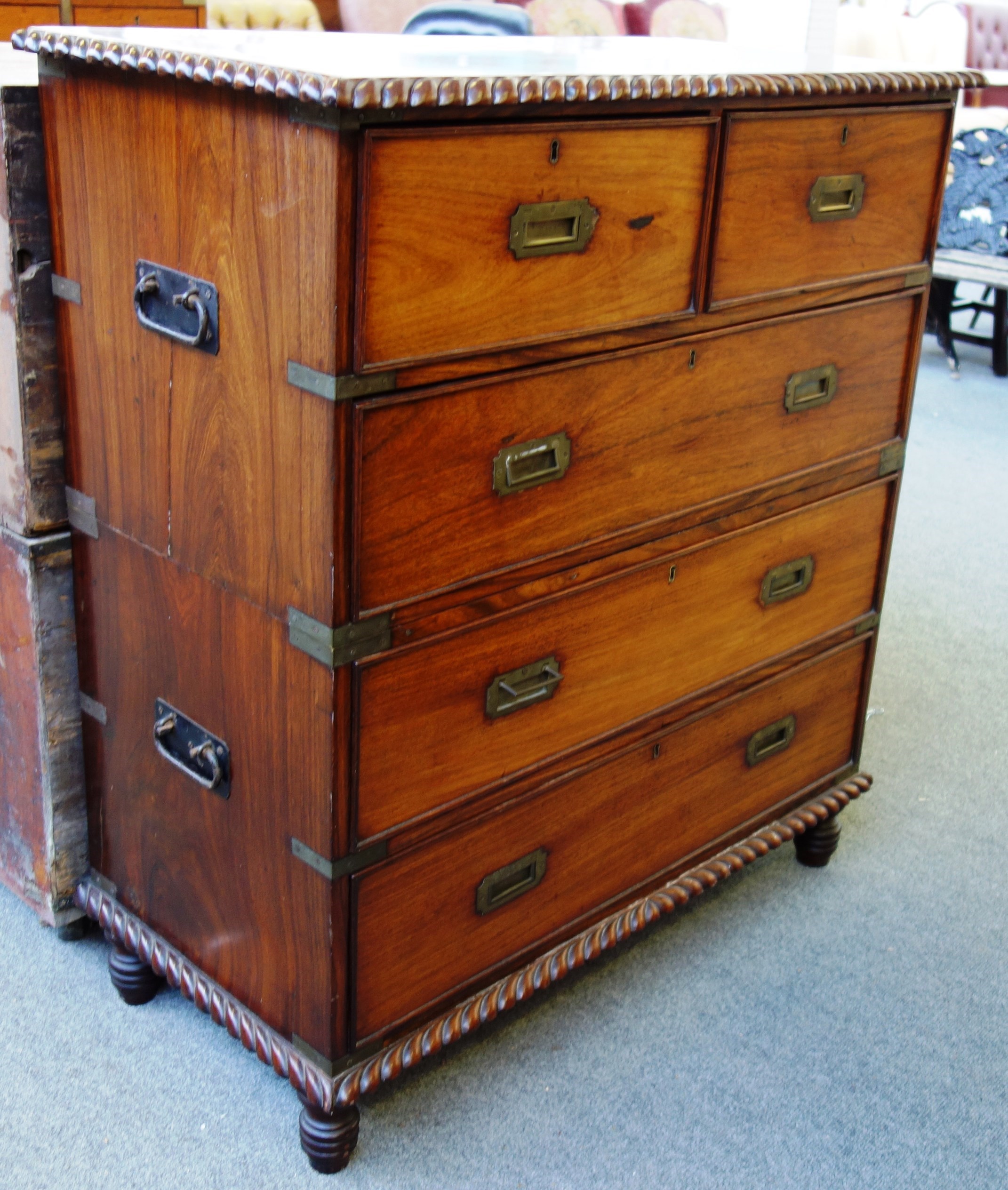 Appraisal: A late th century padouk two part campaign chest of