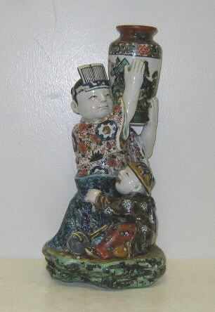 Appraisal: JAPANESE KUTANI PORCELAIN FIGURE GROUP A solid porcelain group of