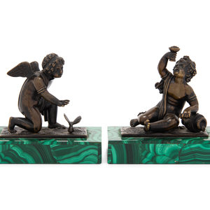 Appraisal: A Pair of Bronze Figures of Kneeling Putti th Century