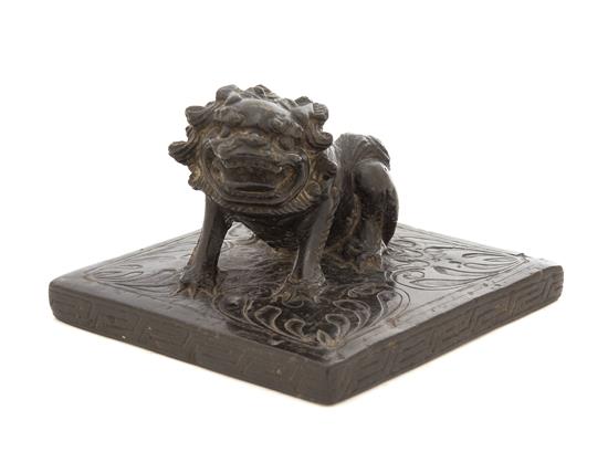 Appraisal: Sale Lot A Chinese Carved Black Stone Buddhistic Lion ming