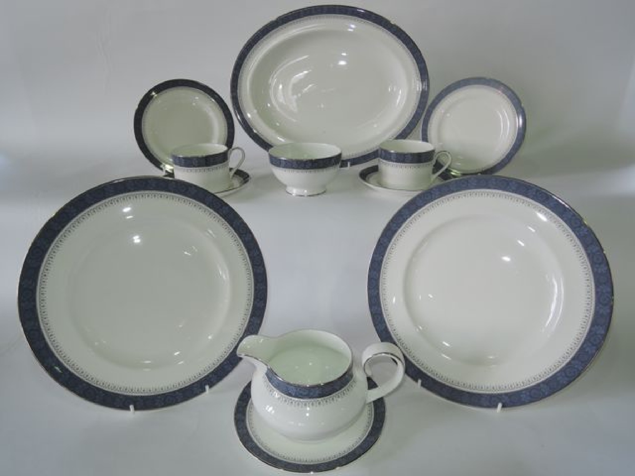 Appraisal: A collection of Royal Doulton Sherbrooke pattern dinner and tea