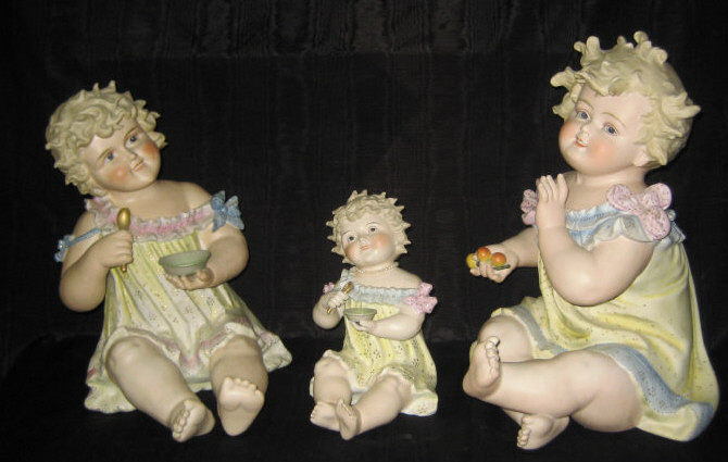 Appraisal: THREE GERMAN BISQUE PORCELAIN PIANO BABIES Schumann Schreider Schwarzenhammer early