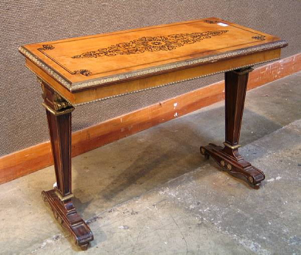 Appraisal: A pair of Charles X style inlaid mahogany side tables