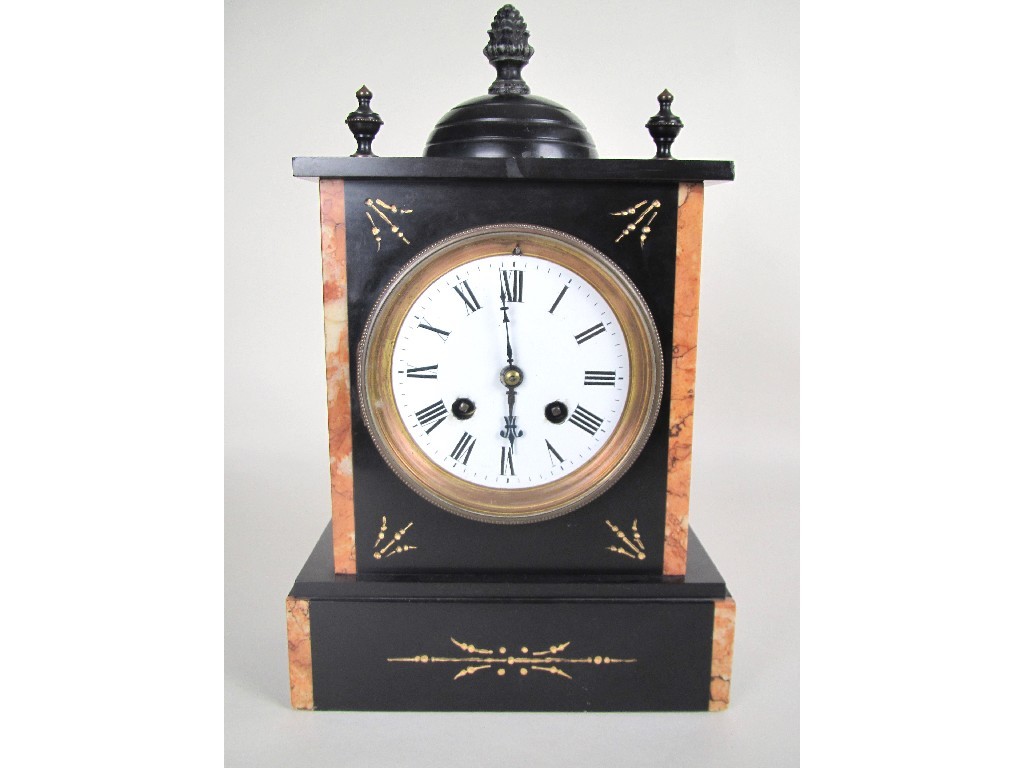 Appraisal: A Victorian black slate and marble mantel clock with domed