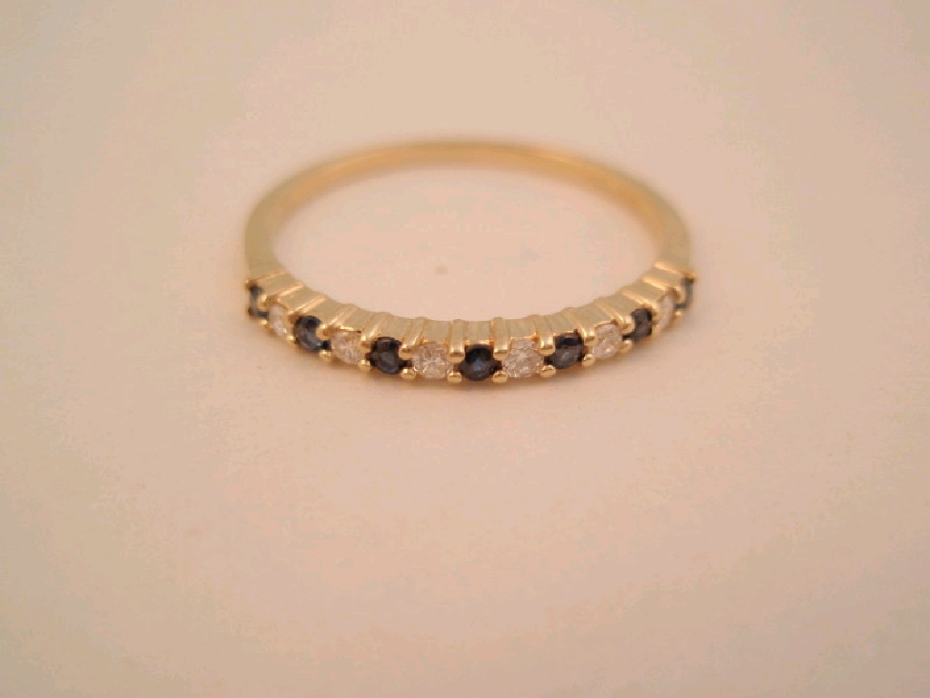 Appraisal: An ct sapphire and diamond half eternity ring