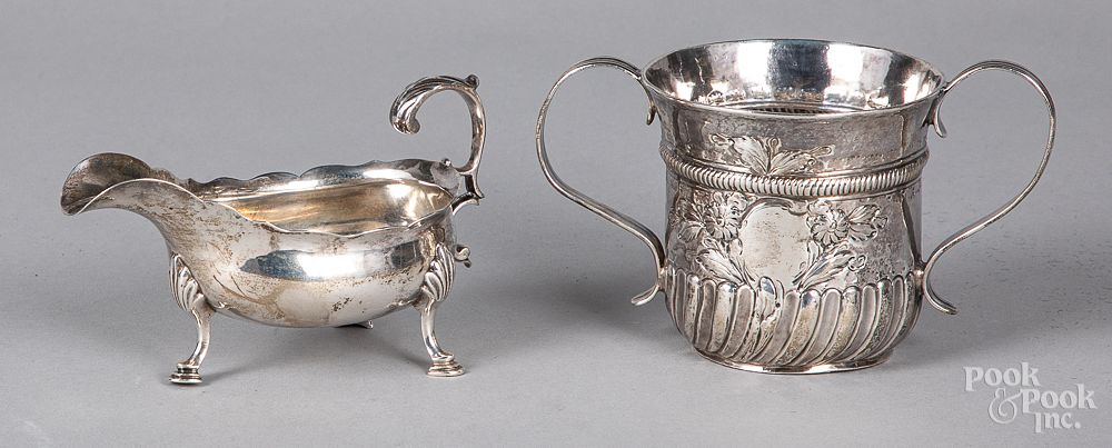 Appraisal: Georgian silver caudle cup and a gravy boat Georgian silver