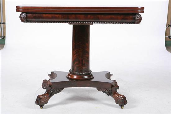 Appraisal: AMERICAN CLASSICAL CARD TABLE Mahogany with a D shaped swivel