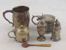 Appraisal: A silver christening cup Birmingham and a silver pepperette Birmingham