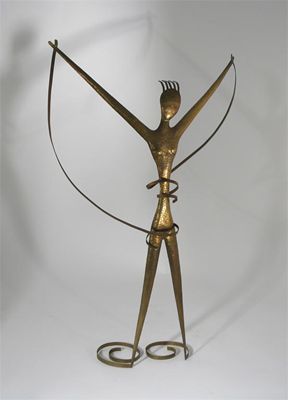 Appraisal: A tall Hagenauer patinated brass figure of a dancing woman