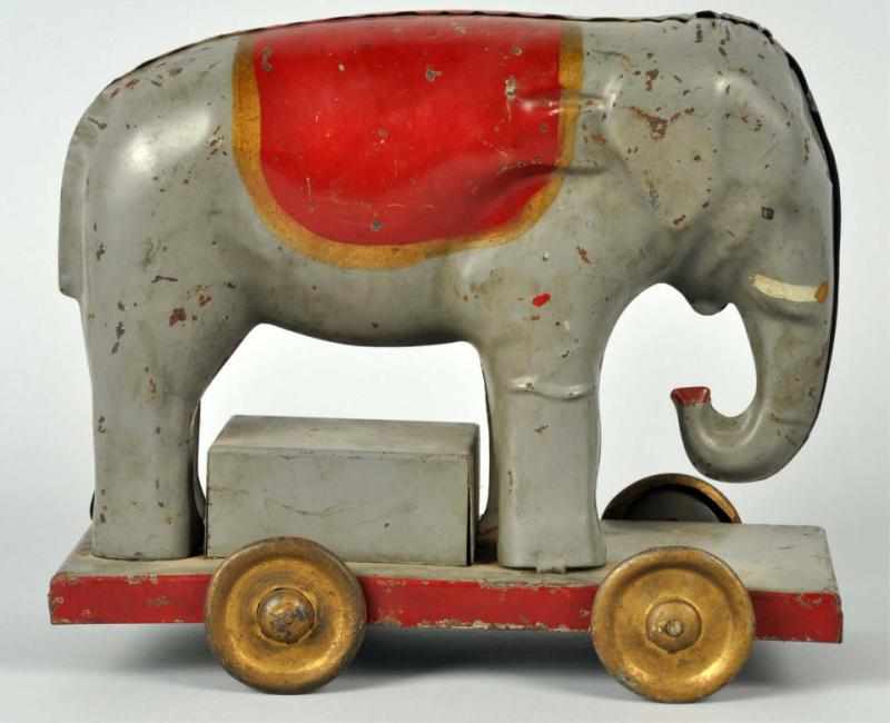 Appraisal: Early Tin Converse Elephant Platform Friction Toy American Working Gold